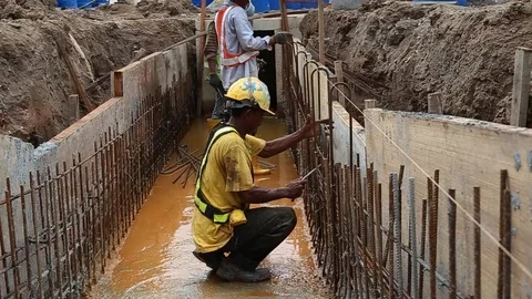 Workes doing works at the large scale of solar farm Stock Footage 96019855