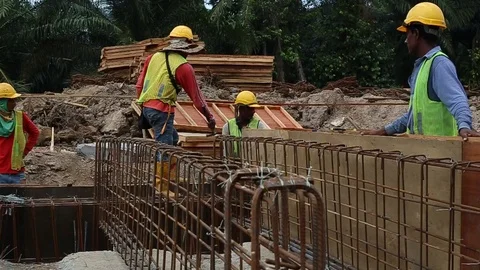 Workes doing works at the large scale of solar farm Stock-Footage 96020248