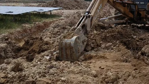 Workes doing works at the large scale of solar farm Stock Footage 96023057