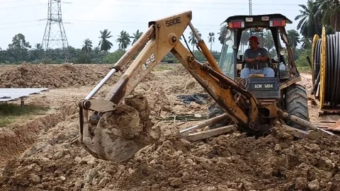 Workes doing works at the large scale of solar farm Stock Footage 96024605