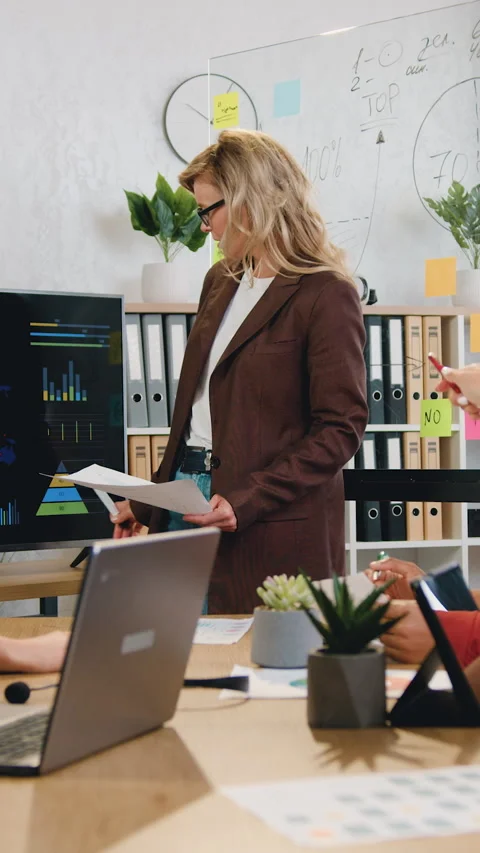 Workflow in boardroom where adorable smart successful qualified multiethnic busi Stock Footage 325125923