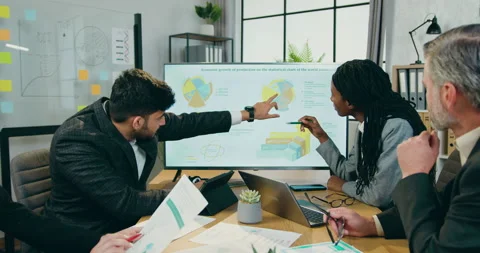 Workflow in company where likable confident motivated qualified mixed race Stock Footage 160927530