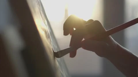 The workflow of creating an artistic masterpiece. The artist in the studio is Stock Footage 257909033