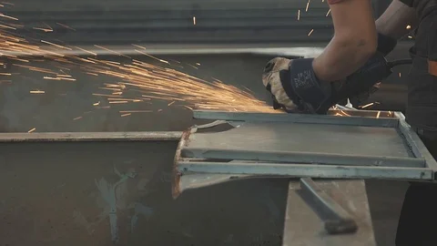 Workflow of a factory worker using tools for working with metal parts Stock Footage 125881268