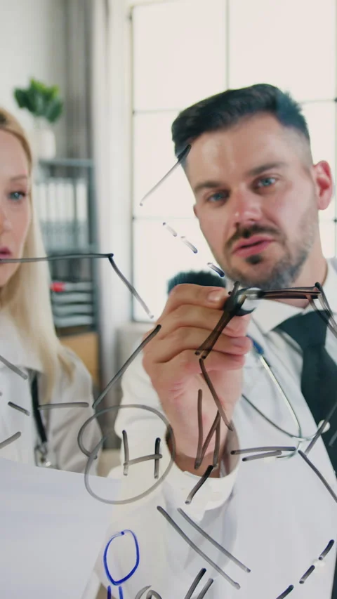 Workflow in medical lab two qualified confident man and woman both medical worke Stock Footage 329431218