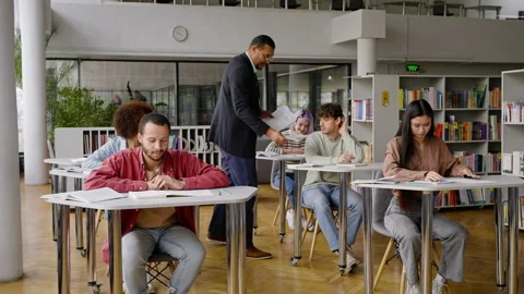 Workflow at the university: Professor distributes semester control cards with Vídeo Stock 233931476