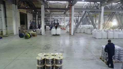 Workflow in a warehouse, active work in a warehouse, forklifts in a warehouse Stock Footage 161990360