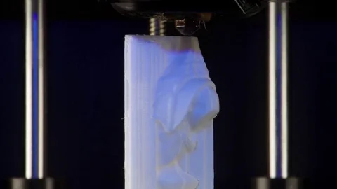 Working 3D printer close up HD video. Process printing three dimensional model Stock Footage 70674193