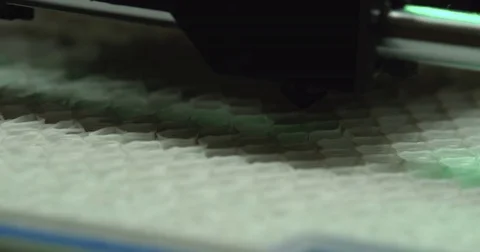 Working 3D printer extreme close up 4k video. Extruder printing model plastic Stock Footage 70672743