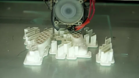 Working 3D printer printing an object from plastic. Stock Footage 311797552