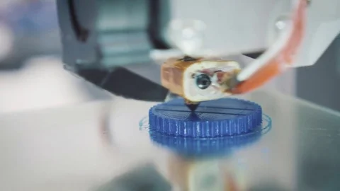 Working 3d printer sequence. 3d the printer prints a plastic part, maybe a piece Stock Footage 77443982