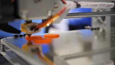 Working 3d printer sequence. Printing with Plastic Wire Filament on 3D Printer Stock Footage 82556434