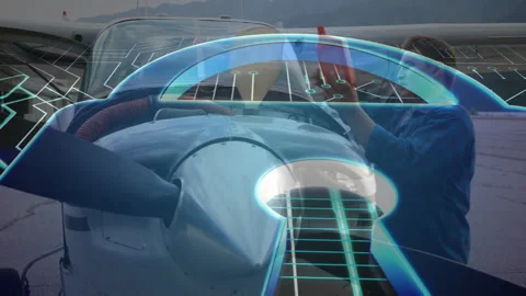 Working on airplane engine, man using digital interface for animation overlay 스톡 동영상 304645201