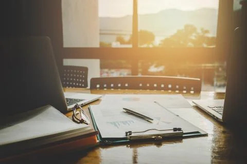 Working, analyzing data report and doing laptop computer with vintage film to 스톡 사진