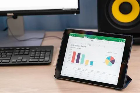 Working and analyzing financial figures on a digital tablet Stock Photos