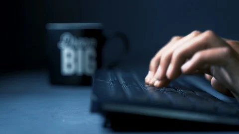 Working and drinking in black mug Stock Footage 121348276