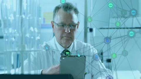 Working with animation, scientist using tablet with network icons overlaying Stock Footage 304857913