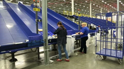 Working around conveyor Stock Footage 50906738