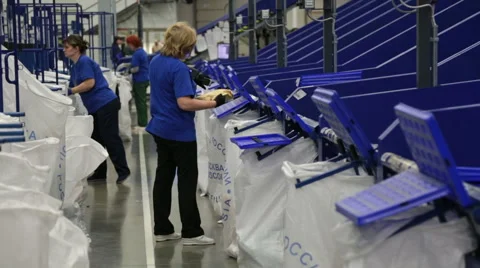 Working around conveyor Stock Footage 50907141