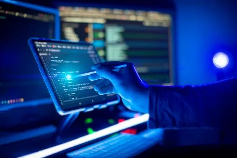 Working atmosphere of a programmer at home, background. Programming code abst Foto stock