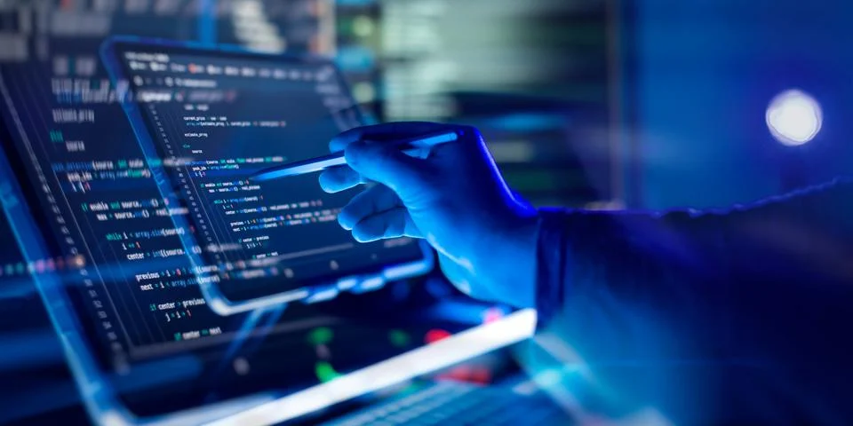 Working atmosphere of a programmer at home, background. Programming code abst Foto stock