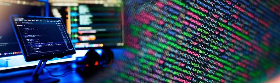 Working atmosphere of a programmer at home, background. Programming code abst 스톡 사진