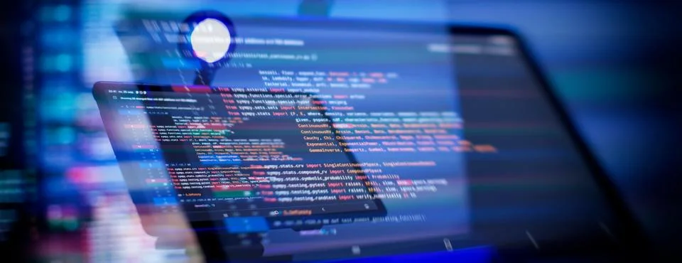 Working atmosphere of a programmer at home, background. Programming code ab.. 스톡 사진