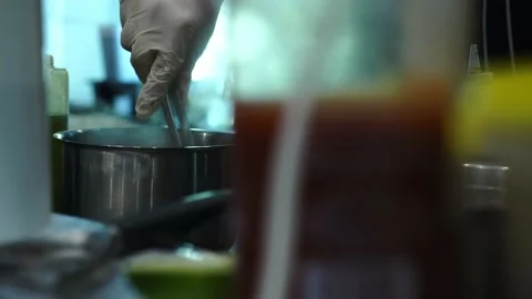 Working atmosphere in the restaurant kitchen. Chefs are preparing the dish. Stock Footage 141420466