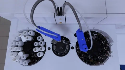 Working automatic biochemical analyzer machine with test tubes in medical lab Stock Footage 112621146