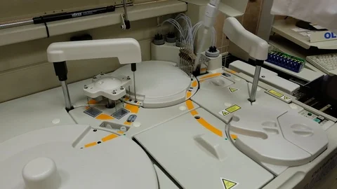 Working of automatic machine. Analysis blood at hospital laboratory. Testing Stock Footage 90819724