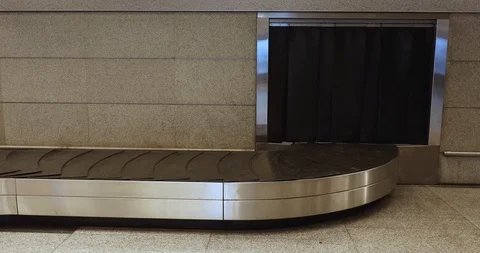 Working Baggage Claim Conveyor Stock Footage 104197796