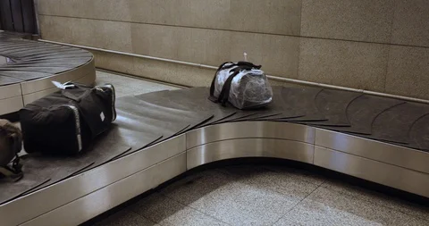 Working Baggage Claim Conveyor Stock-Footage 104197808