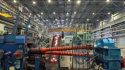 Working ball rolling mill. Production of steel grinding balls Stock Footage 244272680