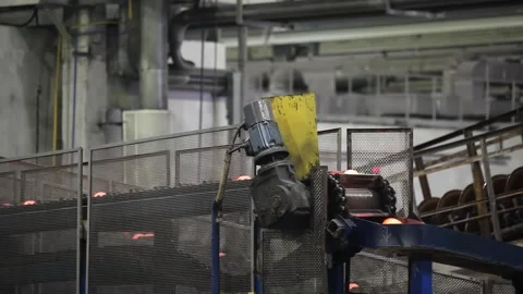 Working ball rolling mill. Production of steel grinding balls Stock Footage 245394783