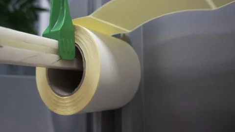 Working with a bar code printer. Direct thermal and thermal transfer label pr Stock Footage 149687313