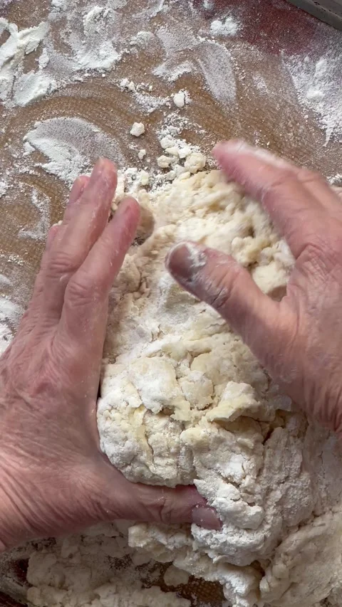 Working with biscuit dough vertical Stock Footage 235631686
