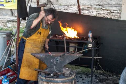 Working blacksmith Stock Photos