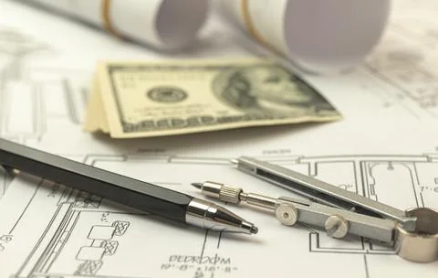 Working with blue prints. Development of cotruction project costs. Expesive a Stock Photos