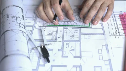 Working on Blueprints Stock Footage 210500224