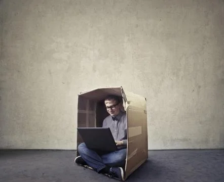 Working on a box Stock Photos