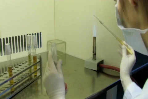 Working with burner close Stock Footage 99054