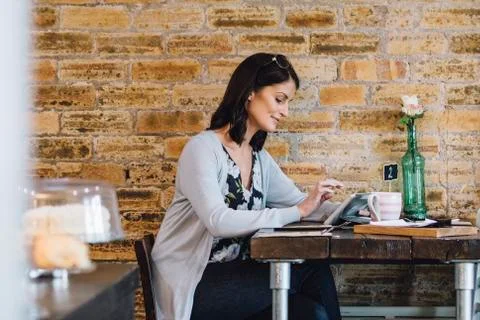 Working In A Cafe Fotos Stock