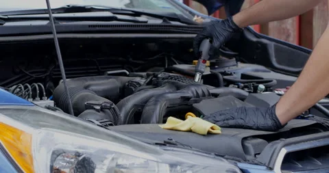 Working on Car Engine Close Up Video stock 131688283