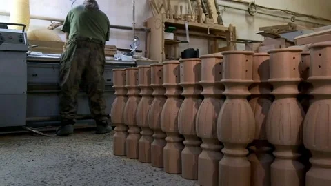 A working carpenter handles a large grinding machine Stock Footage 233487119