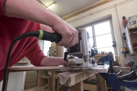 Working in a carpentry with wood Stock Photos