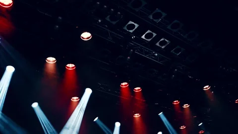 Working ceiling spotlights lightning on a stage Video stock 249936591