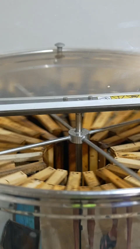 Working centrifuge machine for honey extraction from frames. Electric device Stock Footage 342247969