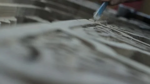 Working a chisel with a khachkar Video stock 142380087