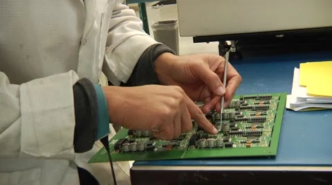 Working on a Circuit Board Stock Footage 43070950