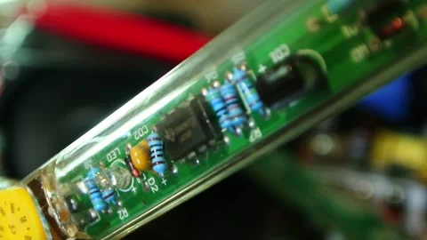 A working circuit board in a transparent case Stock Footage 143728864